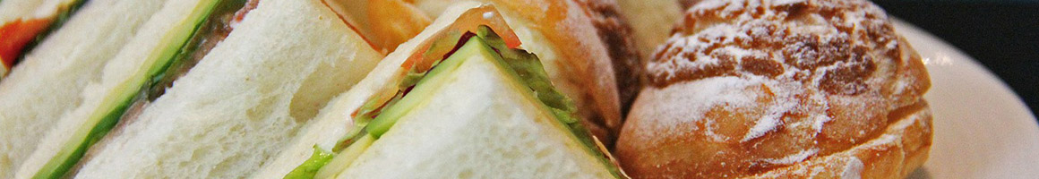 Eating Deli Sandwich at Subman restaurant in Encinitas, CA.
